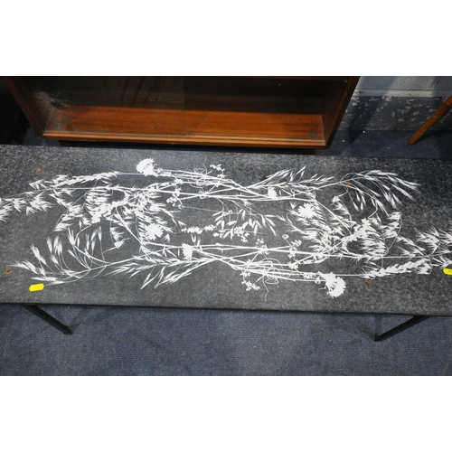 1392 - A JOHN PIPER FOR CONRAN COFFEE TABLE, with floral design on a back field, length 115cm x depth 38cm ... 