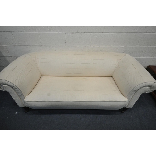 1400 - AN 19TH CENTURY CREAM UPHOLSTERED CHESTERFIELD SOFA, on square tapered legs, and ceramic casters, le... 