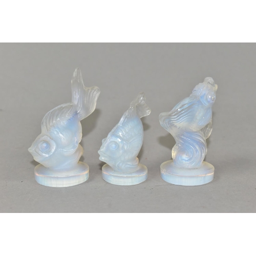 418 - THREE SABINO OPALESCENT GLASS FISH, each on a circular base and marked Sabino, one having a partial ... 