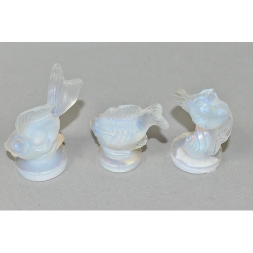 418 - THREE SABINO OPALESCENT GLASS FISH, each on a circular base and marked Sabino, one having a partial ... 