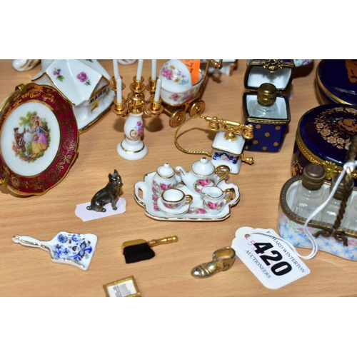 420 - A COLLECTION OF LIMOGES PORCELAIN ITEMS, to include a Dubarry Limoges porcelain basket containing th... 