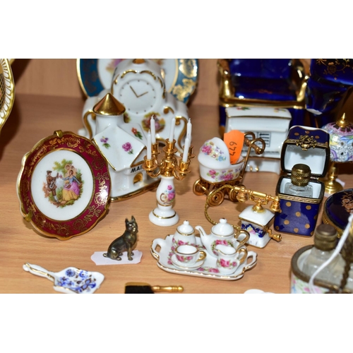 420 - A COLLECTION OF LIMOGES PORCELAIN ITEMS, to include a Dubarry Limoges porcelain basket containing th... 