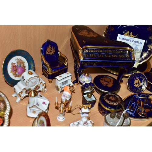 420 - A COLLECTION OF LIMOGES PORCELAIN ITEMS, to include a Dubarry Limoges porcelain basket containing th... 