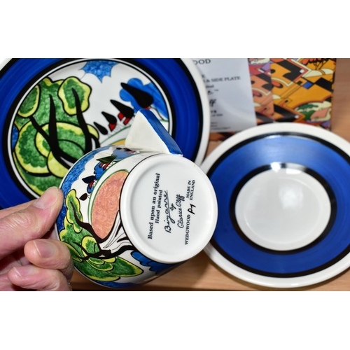 424 - A BOXED WEDGWOOD CLARICE CLIFF LIMITED EDITION 'MAY AVENUE' CONICAL TEACUP, SAUCER AND SIDE PLATE, b... 