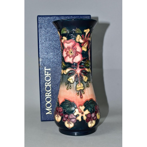 435 - A BOXED MOORCROFT POTTERY OBERON PATTERN VASE, of waisted form, with tube lined flowers and foliage ... 