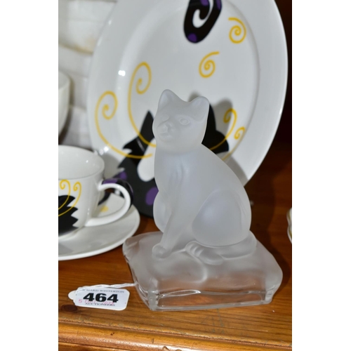 464 - A COLLECTION OF CAT THEMED CERAMICS, comprising a Crystal d'Arques frosted glass figurine of a cat, ... 