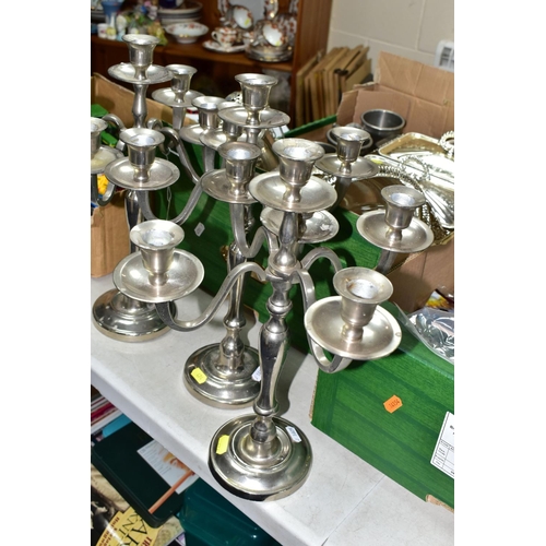 474 - ONE BOX OF METALWARE, to include three stainless steel five flame candelabra, height 39cm, two glass... 