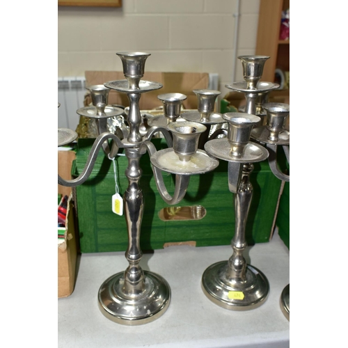 474 - ONE BOX OF METALWARE, to include three stainless steel five flame candelabra, height 39cm, two glass... 