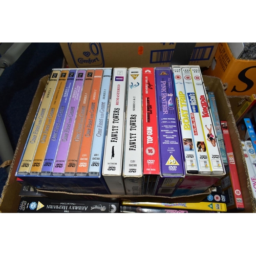 488 - SIX BOXES OF DVDS AND SOFT TOYS, to include over two hundred assorted films and boxed sets, a Sony C... 