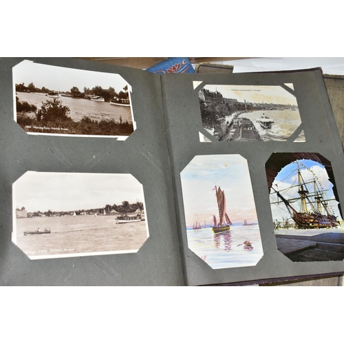 504 - POSTCARDS, three albums containing approximately 312 postcards, album one features early 20th centur... 