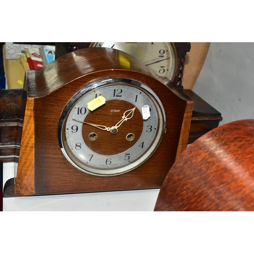 510 - THREE WOODEN MANTEL CLOCKS AND A WOODEN CASED WALL CLOCK, comprising a 1920s Westminster chimes mant... 