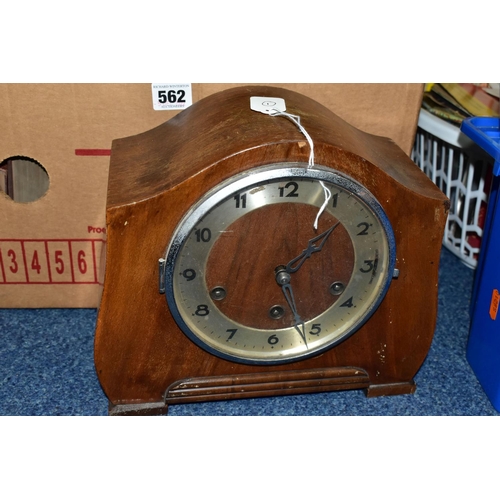 562 - A BOX AND LOOSE BOOKS AND CLOCKS, comprising a Lava 31 day wall clock, a twentieth century wooden ca... 