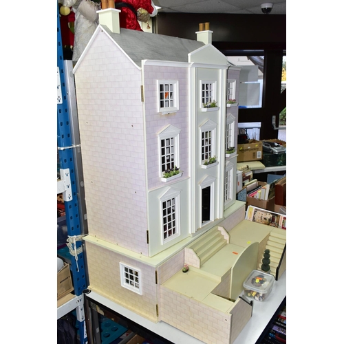 574 - A MODERN FURNISHED DOLLS HOUSE WITH ACCESSORIES ETC, to include a Wentworth Court house 1536i fitted... 