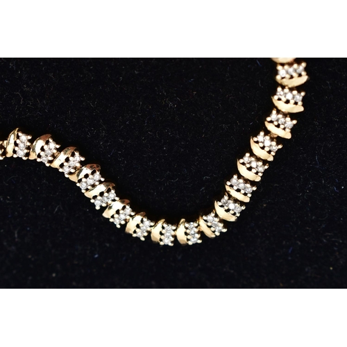 1 - A 9CT GOLD DIAMOND LINE BRACELET, three round brilliant cut diamonds prong set alongside a yellow go... 