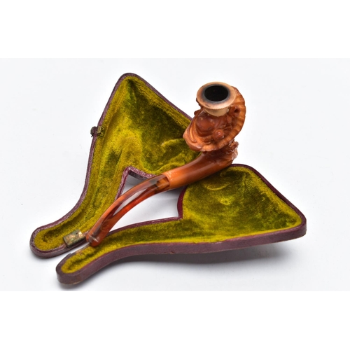 104 - A MEERSCHAUM PIPE, a carved pipe depicting a late 19th century lady in a hat with flowers, approxima... 