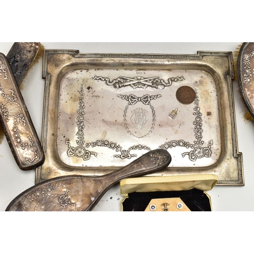 131 - AN EARLY 20TH CENTURY SILVER TRAY AND VANITY PIECES, the tray of a rectangular form, decorated with ... 