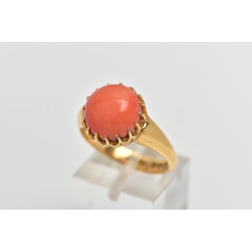 165 - AN EARLY 20TH CENTURY, 18CT YELLOW GOLD CORAL RING, designed with a round coral cabochon, measuring ... 