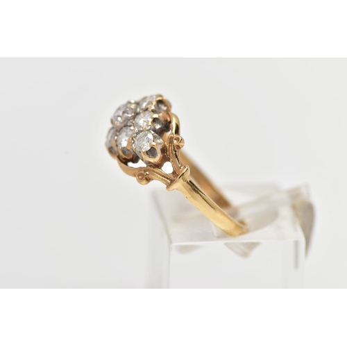 173 - A 9CT YELLOW GOLD DIAMOND CLUSTER RING, of a lozenge shape, set with nine claw set round brilliant c... 