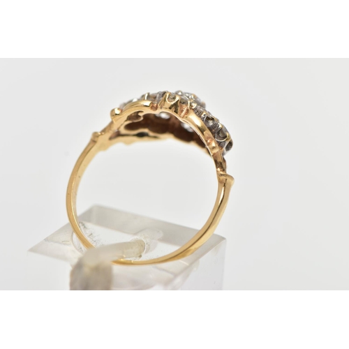 173 - A 9CT YELLOW GOLD DIAMOND CLUSTER RING, of a lozenge shape, set with nine claw set round brilliant c... 