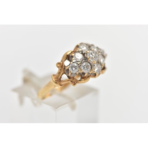 173 - A 9CT YELLOW GOLD DIAMOND CLUSTER RING, of a lozenge shape, set with nine claw set round brilliant c... 