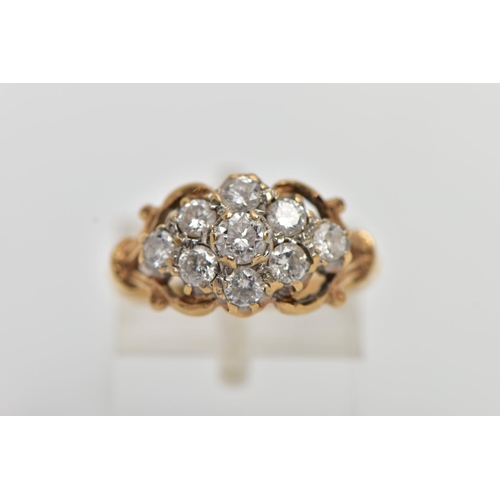 173 - A 9CT YELLOW GOLD DIAMOND CLUSTER RING, of a lozenge shape, set with nine claw set round brilliant c... 