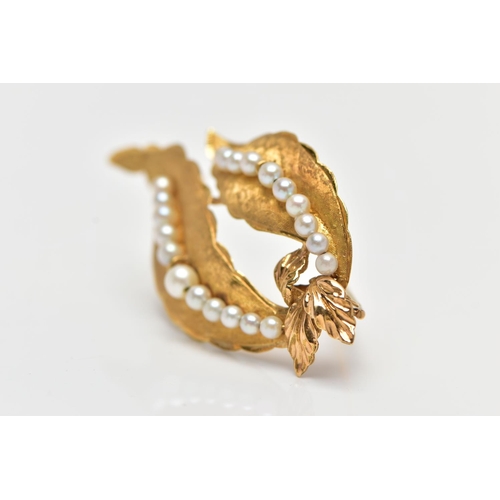 175 - AN 18CT YELLOW GOLD CULTURED PEARL BROOCH, in the form of two leaves, each stain finish leaf is set ... 