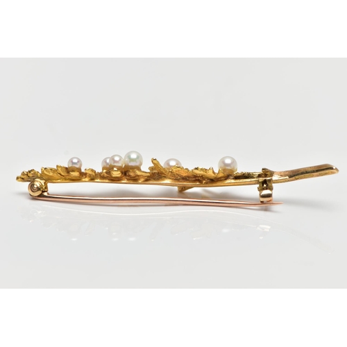 176 - A 9CT YELLOW GOLD BROOCH, in the form of a leaf, set with seven graduated cultured pearls, fitted wi... 