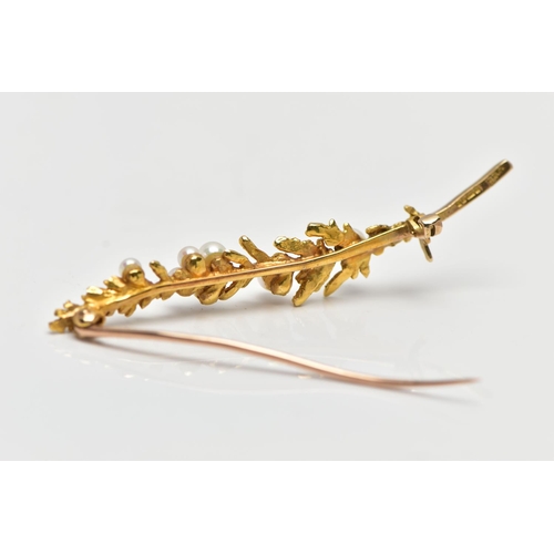 176 - A 9CT YELLOW GOLD BROOCH, in the form of a leaf, set with seven graduated cultured pearls, fitted wi... 