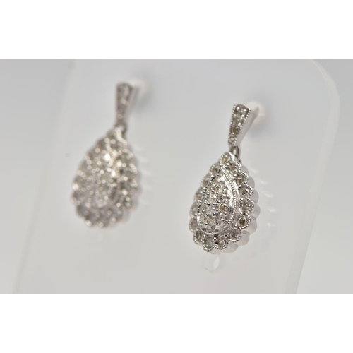 181 - A PAIR OF 9CT WHITE GOLD DIAMOND DROP EARRINGS, each earring of a pear drop shape set with a cluster... 