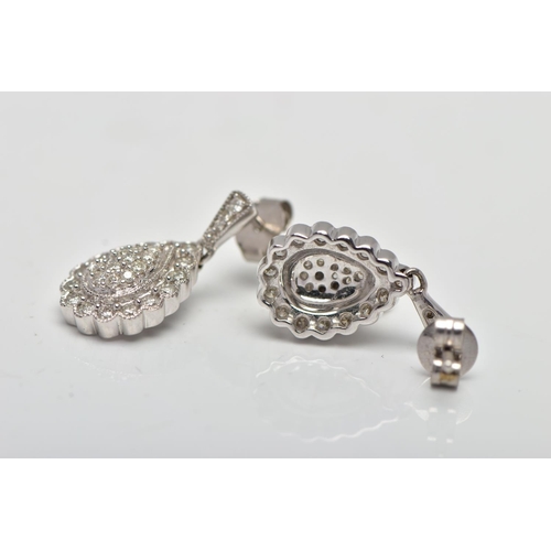 181 - A PAIR OF 9CT WHITE GOLD DIAMOND DROP EARRINGS, each earring of a pear drop shape set with a cluster... 