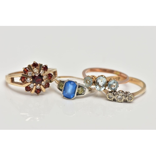 19 - A SELECTION OF FOUR GEM SET RINGS, to include an early 20th century blue and colourless paste three ... 