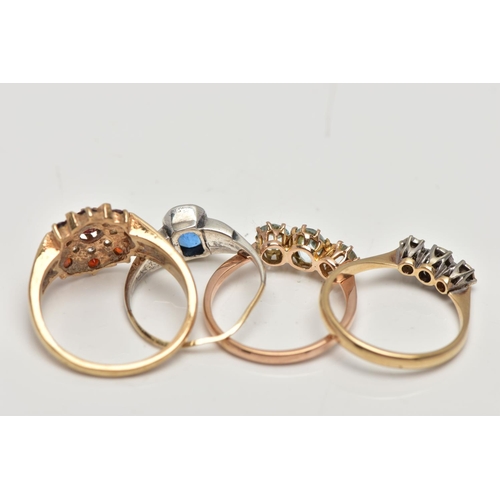 19 - A SELECTION OF FOUR GEM SET RINGS, to include an early 20th century blue and colourless paste three ... 