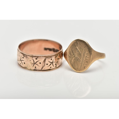 21 - TWO 9CT GOLD RINGS, the first a wide band ring, engraved with a partly worn ivy leaf foliage design,... 