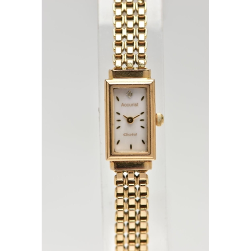 29 - A 9CT GOLD 'ACCURIST' WRISTWATCH, quartz movement, rectangular mother of pearl dial, signed 'Accuris... 