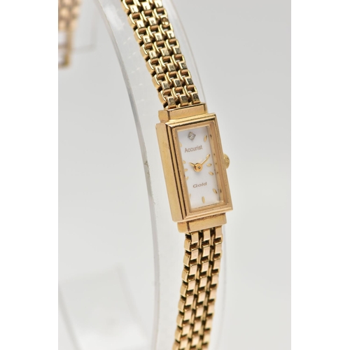 29 - A 9CT GOLD 'ACCURIST' WRISTWATCH, quartz movement, rectangular mother of pearl dial, signed 'Accuris... 