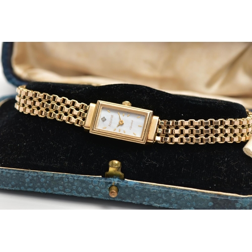 29 - A 9CT GOLD 'ACCURIST' WRISTWATCH, quartz movement, rectangular mother of pearl dial, signed 'Accuris... 