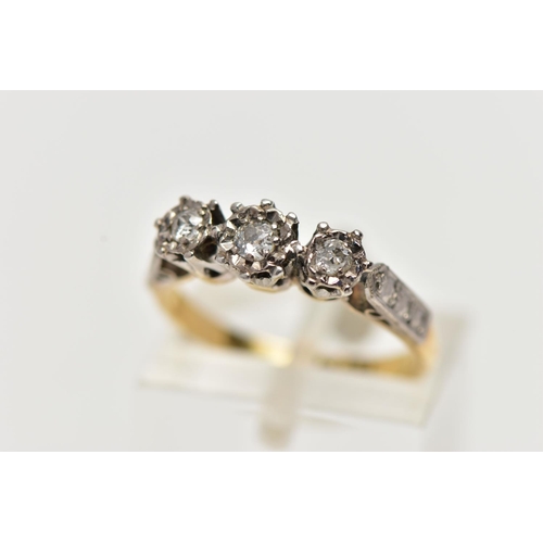 3 - A YELLOW METAL DIAMOND TRILOGY RING, designed with three illusion set old cut diamonds, raised open ... 