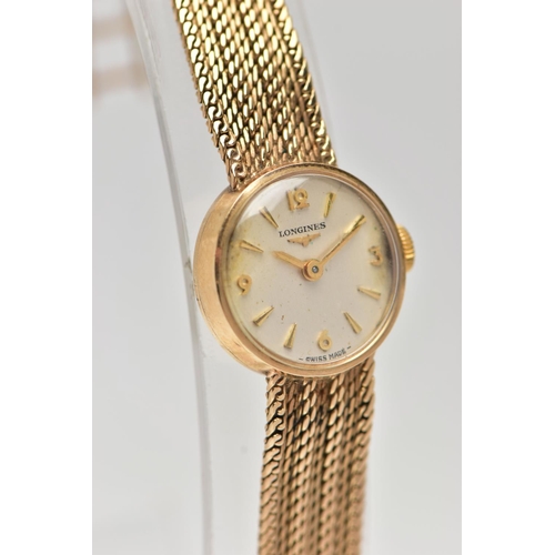 33 - A LADIES 9CT GOLD 'LONGINES' WRISTWATCH, manual wind, round silver dial signed 'Longines', Arabic tw... 