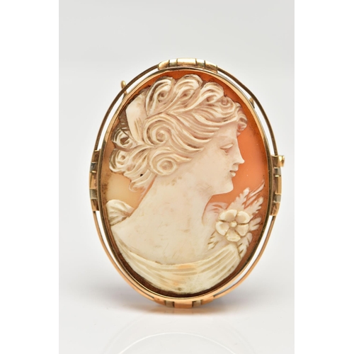 35 - A FRENCH 18CT GOLD CAMEO BROOCH, of an oval form, carved shell cameo depicting a lady in profile, co... 