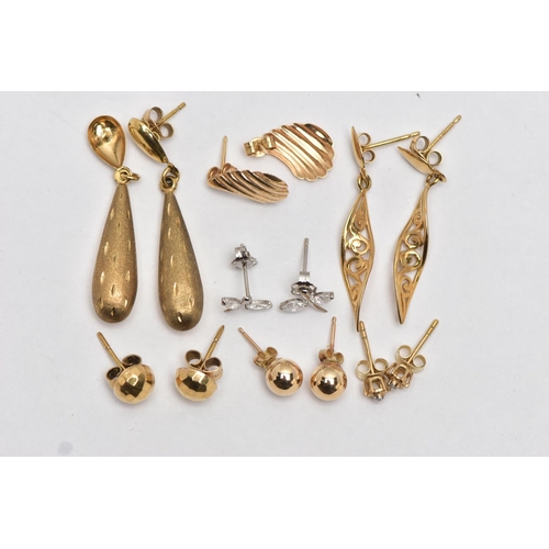 36 - A SMALL BAG OF ASSORTED EARRINGS, to include a pair of hollow tear drop earrings with a stain textur... 