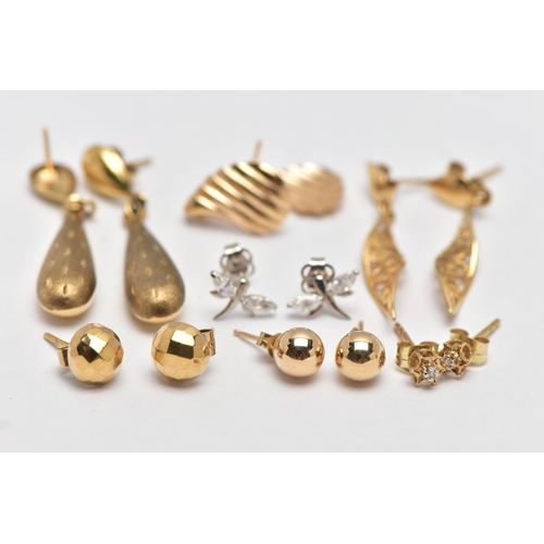 36 - A SMALL BAG OF ASSORTED EARRINGS, to include a pair of hollow tear drop earrings with a stain textur... 