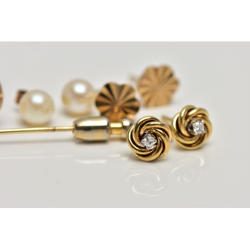 38 - A SMALL BAG OF ASSORTED YELLOW METAL EARRINGS AND A STICK PIN, to include a pair of crescent and cul... 