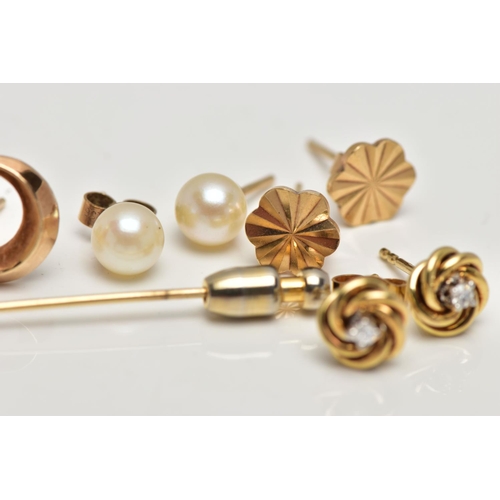 38 - A SMALL BAG OF ASSORTED YELLOW METAL EARRINGS AND A STICK PIN, to include a pair of crescent and cul... 