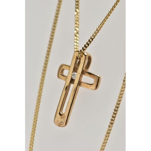 40 - A 9CT GOLD DIAMOND SET CROSS PENDANT AND CHAIN, the openwork cross pendant set with a single round b... 