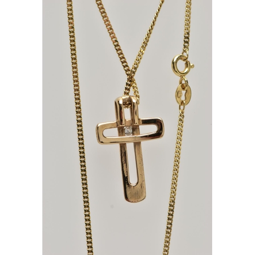 40 - A 9CT GOLD DIAMOND SET CROSS PENDANT AND CHAIN, the openwork cross pendant set with a single round b... 