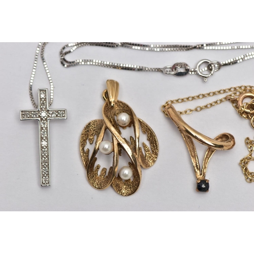 41 - TWO PENDANT NECKLACES AND A PENDANT, to include a white metal cross pendant set with single cut diam... 