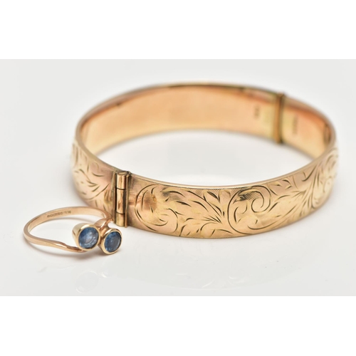 43 - A 9CT GOLD SAPPHIRE RING AND A GOLD PLATED HINGED BANGLE, the ring of a cross over design, set with ... 