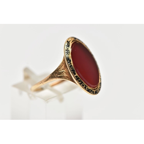 53 - A YELLOW METAL AND CARNELIAN MOURNING RING, of an oval form, set with a central oval cut polished ca... 