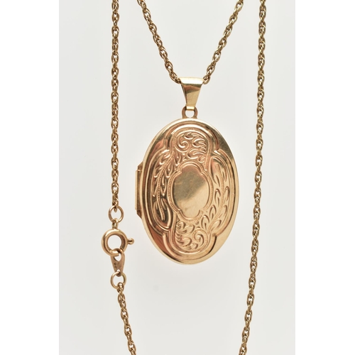 59 - A 9CT GOLD LOCKET AND CHAIN, the locket of an oval form, decorated with a foliate pattern and vacant... 