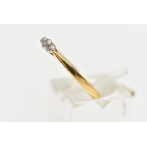 60 - AN 18CT GOLD THREE STONE DIAMOND RING, to the centre is a collet set old cut diamond, flanked with t... 